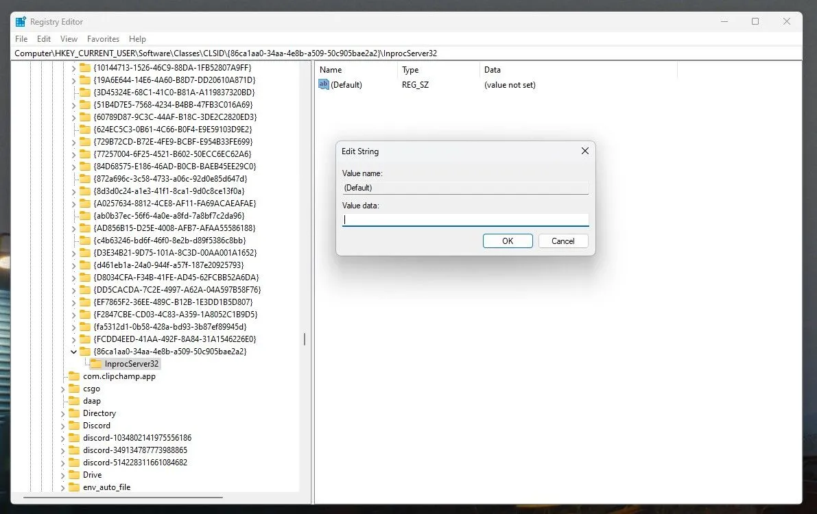 Cửa sổ Registry Editor hiển thị giá trị mặc định của khóa InprocServer32 cần được chỉnh sửa
