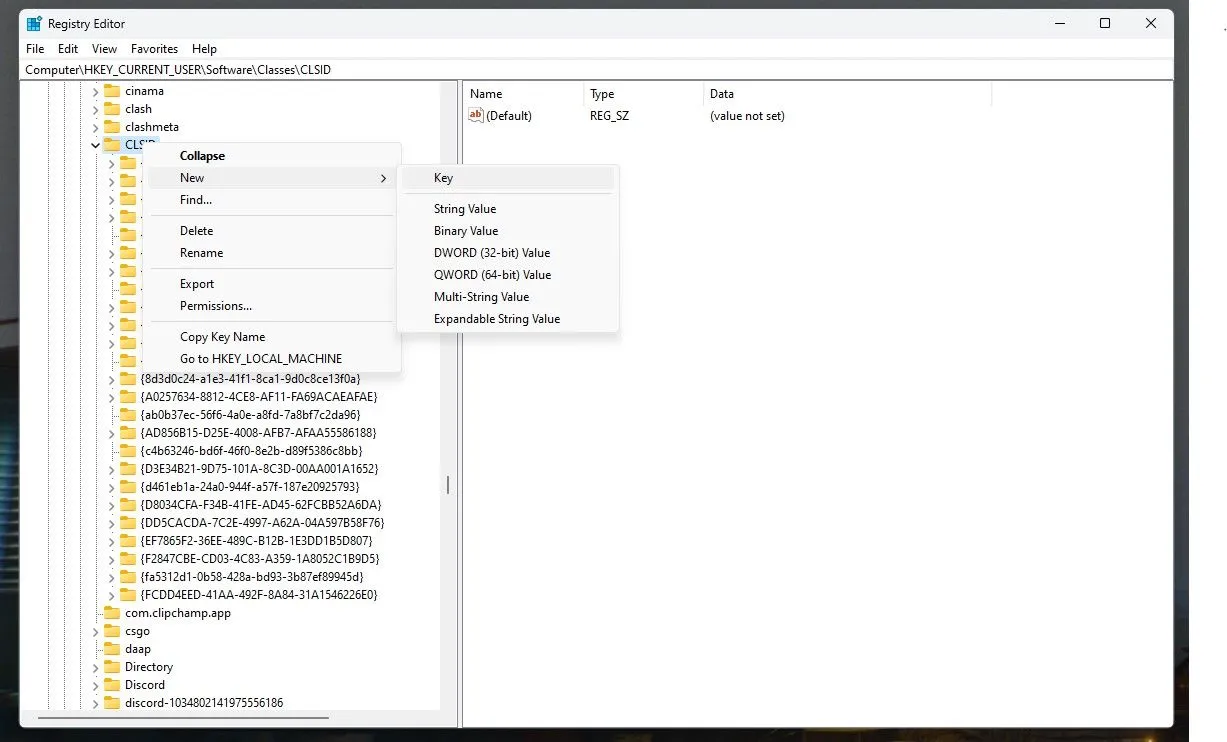Giao diện Registry Editor Windows 11 đang tạo khóa CLSID mới để khôi phục menu chuột phải