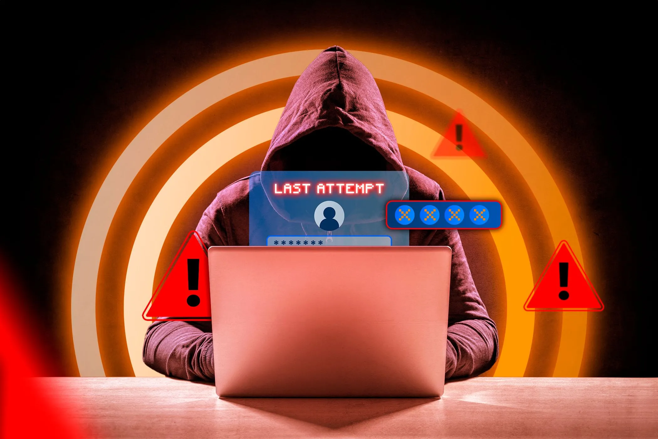 Hacker trước máy tính với cửa sổ đăng nhập và cảnh báo