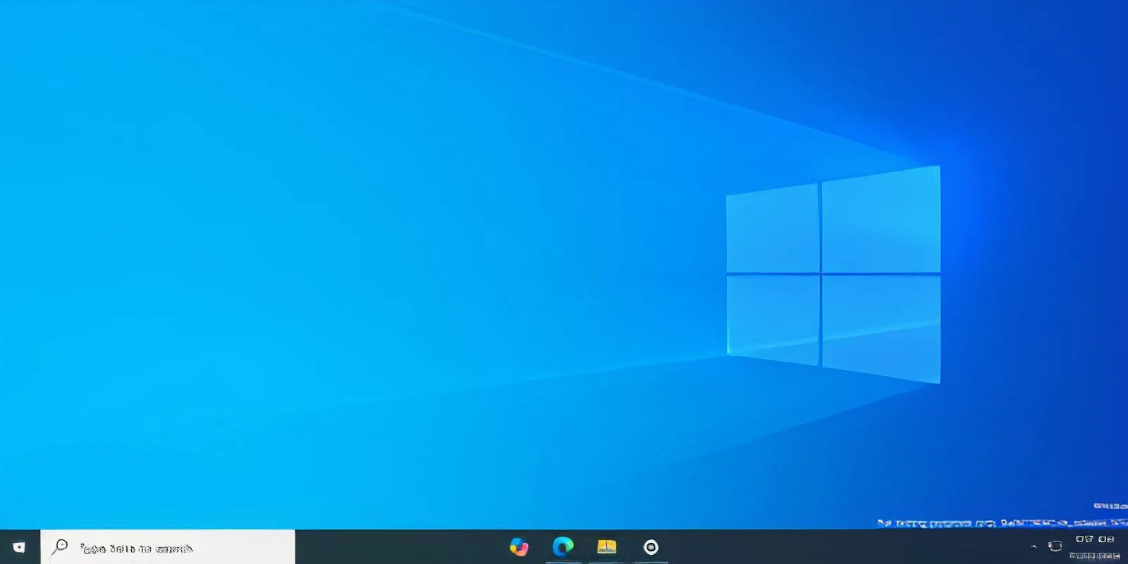 Màn hình desktop Windows 10 hiển thị thanh Taskbar với các biểu tượng ứng dụng đã được căn giữa bằng phần mềm TaskbarX.